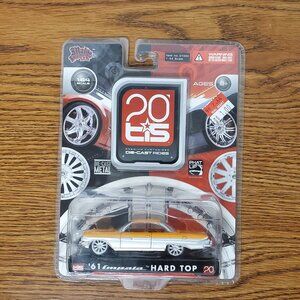 Die Cast Limited TIS Orange '61 Impala Hard Top - New in Package